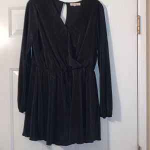 Black romper with a chest closure